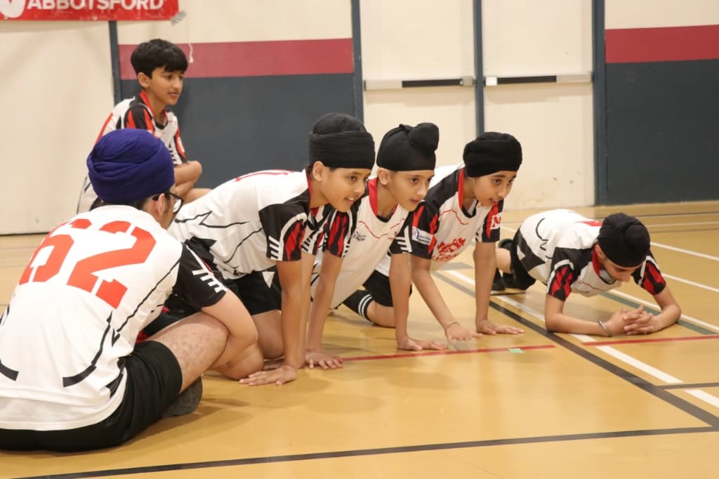 Players performing indoor fitness drills