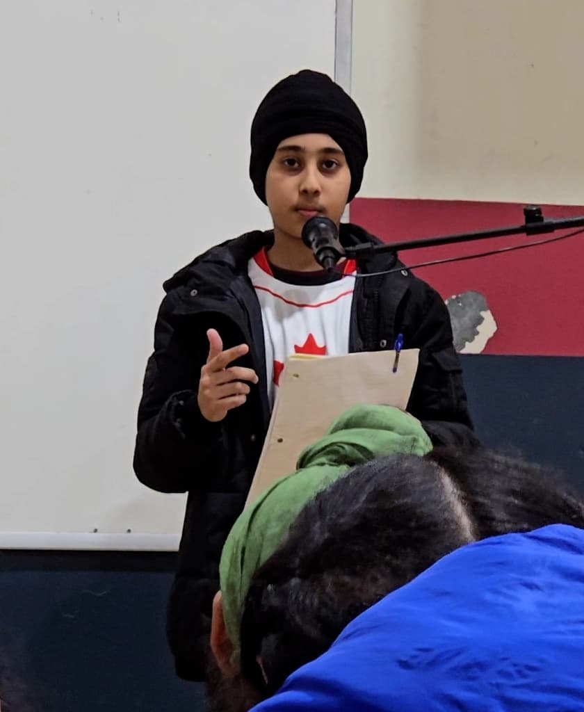 Youth player speaking at ceremony